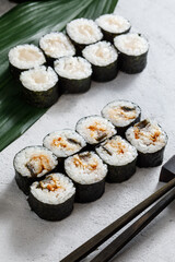 sushi with chopsticks
