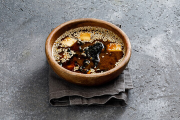 bowl of asian soup with seafood