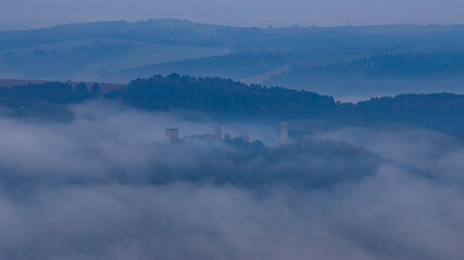 The Brandenburg Castle in the Werra Valley in the morning fog