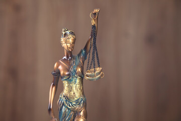 justice lady on wooden background
