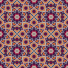 Abstract seamless mandala background. Texture in violet and orange colors. Oriental pattern for design, fashion print, scrapbooking