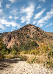 Fototapeta na wymiar Mountain peak in Cheyenne Canyon Colorado Springs during a fall day with leaves changing color