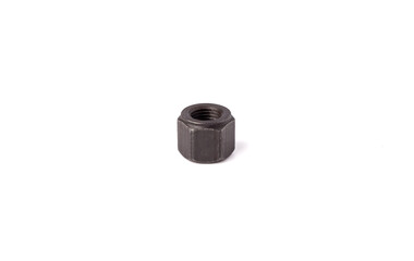 One macro metallic screw nut isolated on white background. Female screw nut with copy space. Heavy hex nut.