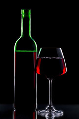 Glasses of wine on a black background.