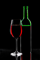Glasses of wine on a black background.