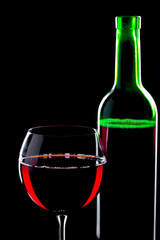 Glasses of wine on a black background.