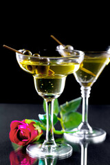 Glasses of wine on a black background.