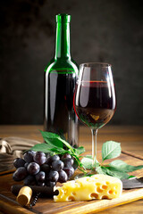 Wine in a glass on an old background