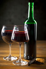 Wine in a glass on an old background
