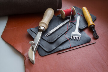 Leather. Sewing a wallet. Leather work. Tools for sewing bags, wallets, clutches. Sewing products...