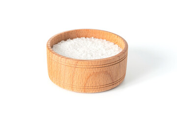 Salt in wooden bowl isolated on white background.