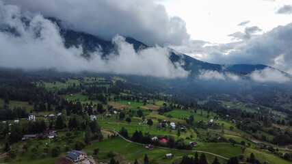Obraz premium Cloudy Day in Mountains of Romania, Aerial View