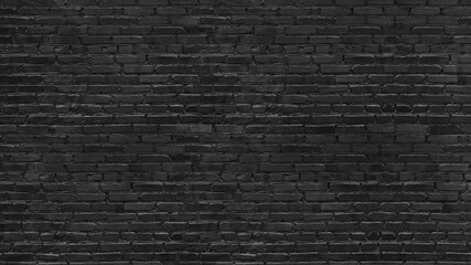 Old rough black brick wall large texture. Dark grey brickwork masonry backdrop. Gloomy grunge...