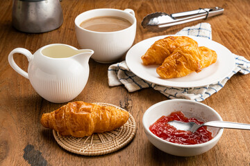 Breakfast with croissants and milk coffee.