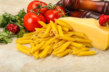 Raw penne rigate for cooking