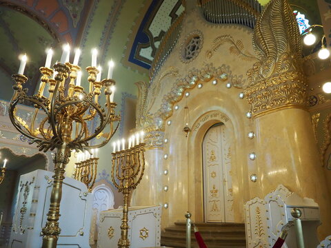Bima, an elevation usually in the center of the synagogue, where there is a special table for public reading of the Torah scroll and the book of the Haftorian prophets during worship in the synagogue.