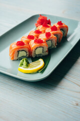 Japanese food photography, beautiful serving of sushi rolls, photography for restaurant menu