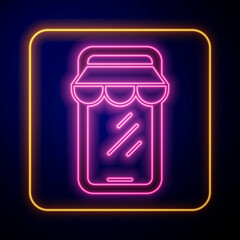 Glowing neon Online shopping on mobile phone icon isolated on black background. Internet shop, mobile store app and payments billing. Vector