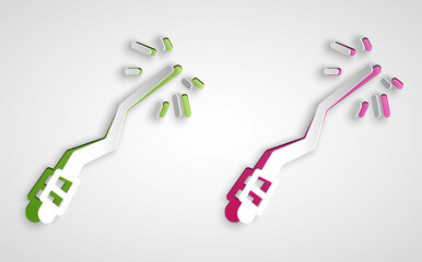 Paper cut Magic wand icon isolated on grey background. Star shape magic accessory. Magical power. Happy Halloween party. Paper art style. Vector