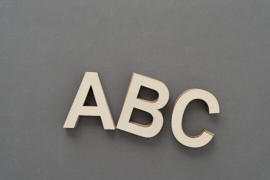the letters abc on gray