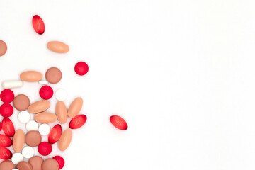 Pharmaceutical industry, pharmacy and healthcare, top view of red, yellow and beige vitamins, pills and capsules, medicines on white background, flat lay with blank space