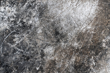 Fototapeta premium Scratched metal chrome effect compressed background. Damaged texture gray industrial surface panel. Stock photo