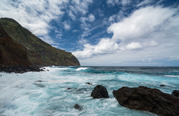 Obraz premium Volcano cliffs and Antlantic oceanPorto Moniz, Madeira, Portugal