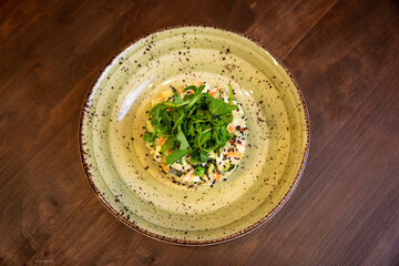 Healthy vegetable salad of fresh tomato, cucumber, onion, spinach, lettuce and sesame on plate. Diet menu.