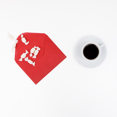 Top view of composition of cup of coffee on white wood background. Christmas morning in Scandinavian minimalist style. Food, drink, object concepts. rustic monochrome style