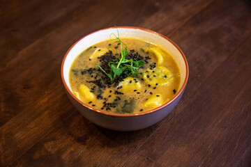detox soup in bowls on rustic wooden board, Clean eating, dieting, vegan, vegetarian, healthy food concept