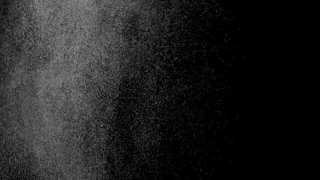 Elegant refreshing raindrops cloud flies on black background