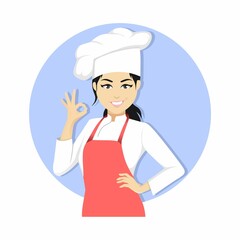 Confident young Asian female chef in uniform winks one eye and gestures with her hand