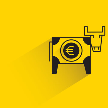 euto coin with cash cow concept on yellow background
