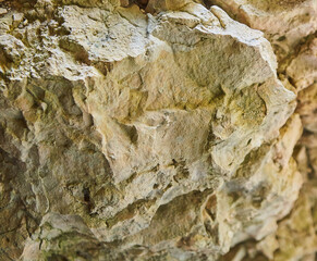 Texture of the surface of a wild stone, rock, or block. Natural material