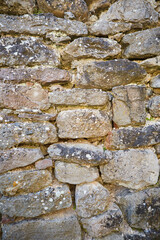 Background texture of a stone wall photo. Natural stone wall texture for the background. Old brick texture