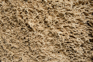 Texture of the surface of a wild stone, rock, or block. Natural material