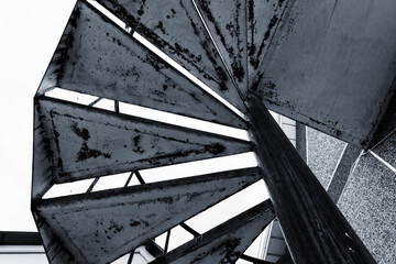 Grungy spiral ladder, abstract photo