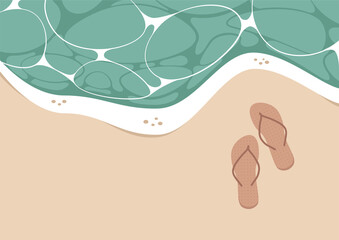 Summer vacation, a tropical beach top view, a pair of flip flops on the shore, sand and turquoise water