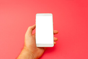 Hand holding white 3d smartphone against red background. 3D illustration design template background. Top mobile phone message. Advertisement idea. Blank copy space for ad.