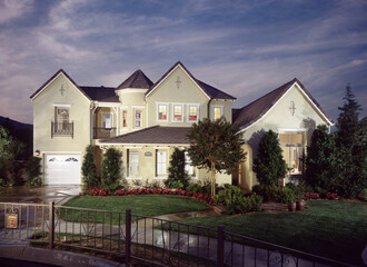New Home with landscaping at dusk housing project
