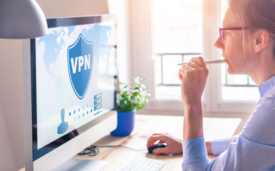 VPN secure connection for freelancer Person using Virtual Private Network technology on computer to...