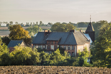 Fototapeta na wymiar Old village with historic buildings in Poland