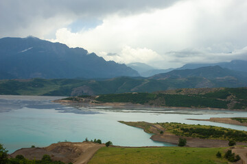 blue reservoir and forest