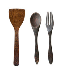 Wooden spatula with hole handle and wooden spoon and fork isolated on a white background