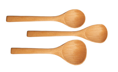 Three different wooden spoons isolated on a white background