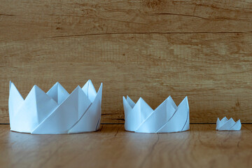 Paper crown. Three paper white crowns.