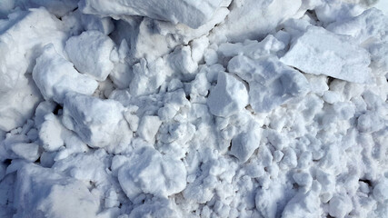 Fototapeta premium Lumps of snow. Loose snow background