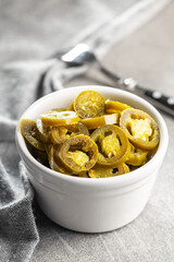 Pickled sliced jalapeno. Green jalapeno peppers