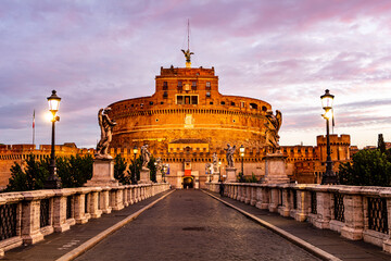 Obraz na płótnie Canvas Castle of Holy Angel and Holy Angel Bridge over the Tiber River in Rome at Dawn, Italy