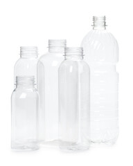 many different empty plastic bottles isolated on white background.